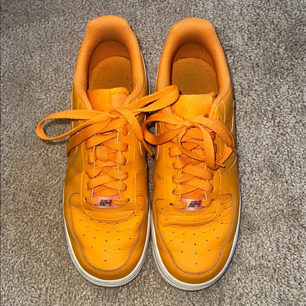 Nike Women's Sneakers in Vibrant Orange